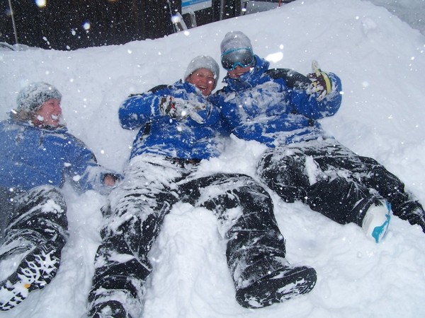 Lifties playing in the new snow